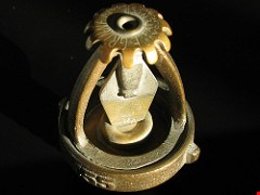 The necessity of building sprinkler systems debated